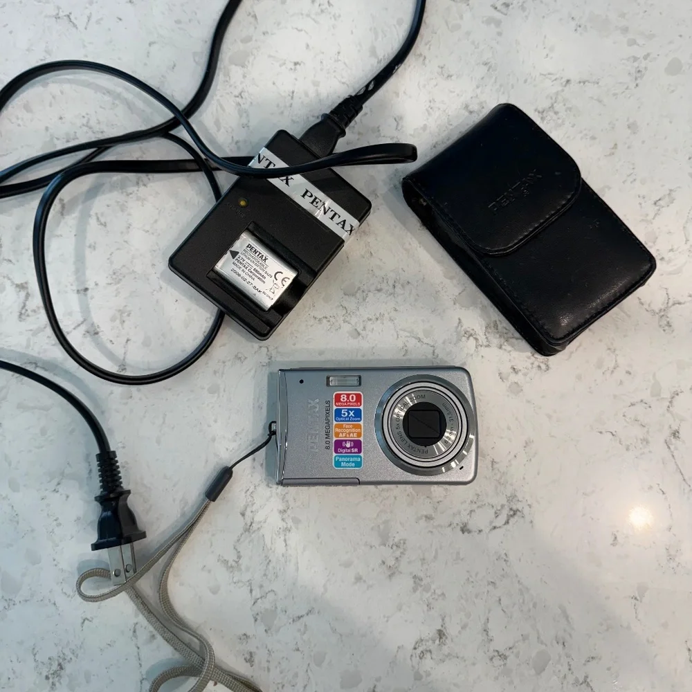 Pentax Optio M50 8.0MP Compact Digital Camera Silver Charger, 2 Batteries Bundle